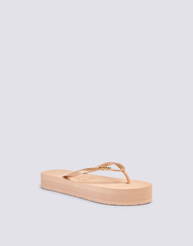 TONGS À PAILLETTES ET SEMELLE HAUTE