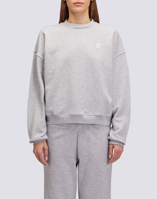 SUDADERA CON CUELLO REDONDO DESGARZADO