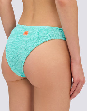 SLIP SGAMBATO A VITA ALTA IN TESSUTO GOFFRATO