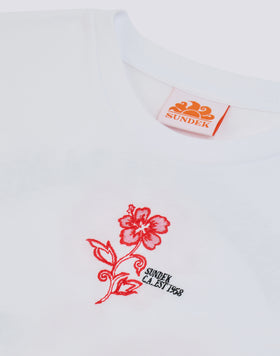 CAMISETA CONFORT PARA NIÑA CON ESTAMPADO MAXI HIBISCUS PARADISE EN LA ESPALDA